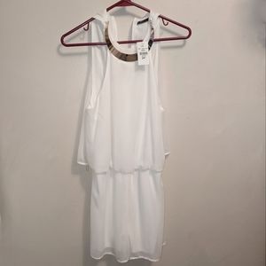 White Romper with gold necklace